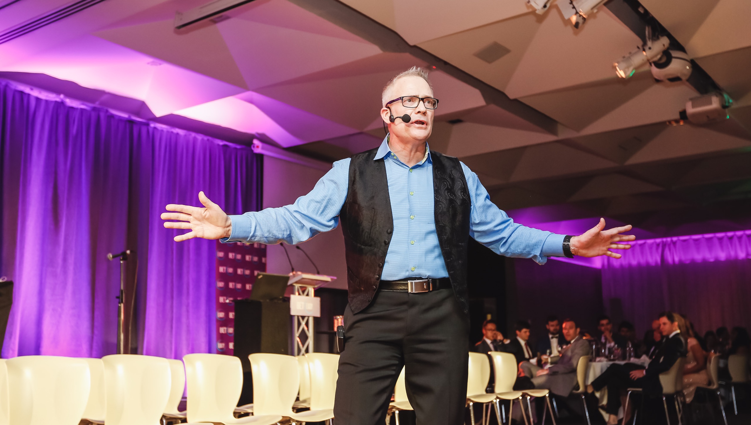 Hypnotist Gerard V in action at a corporate event